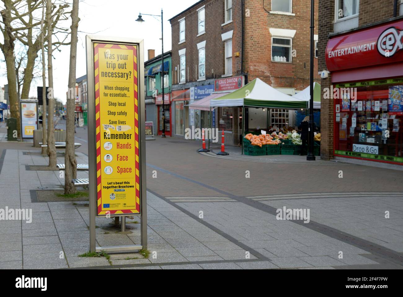 Corona Virus warning sign on pedestrian street Stock Photo - Alamy