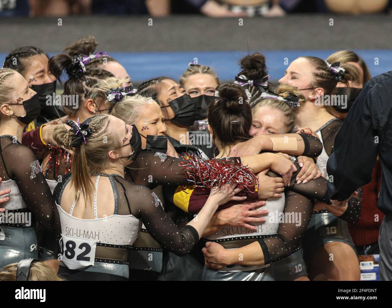 The Minnesota women's gymnastics team embraces following their 1st ...