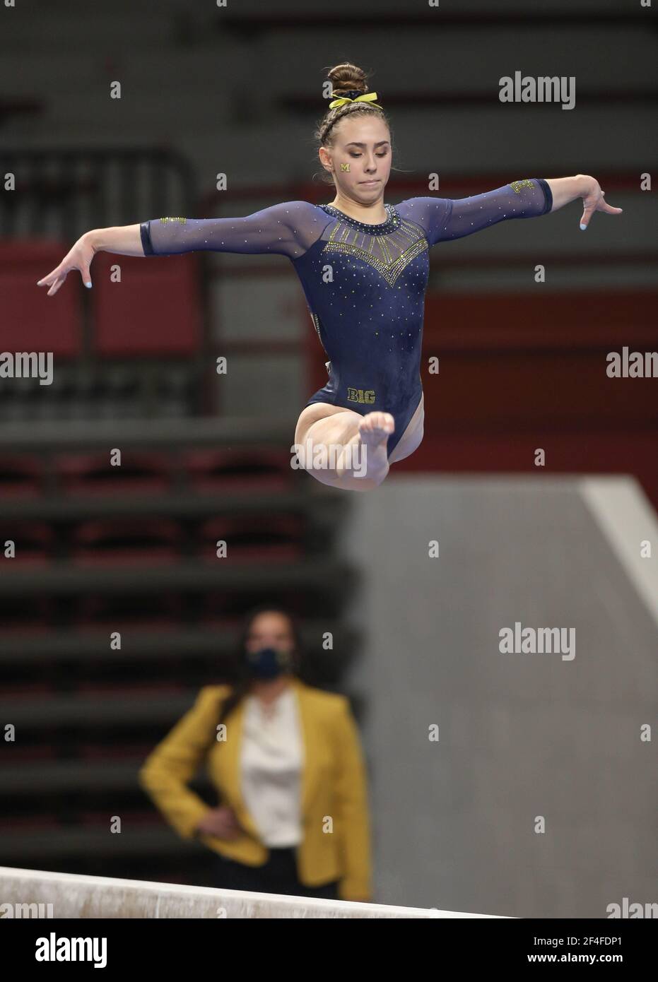 Michigan's Natalie Wojcik performs on the balance beam during the 2021