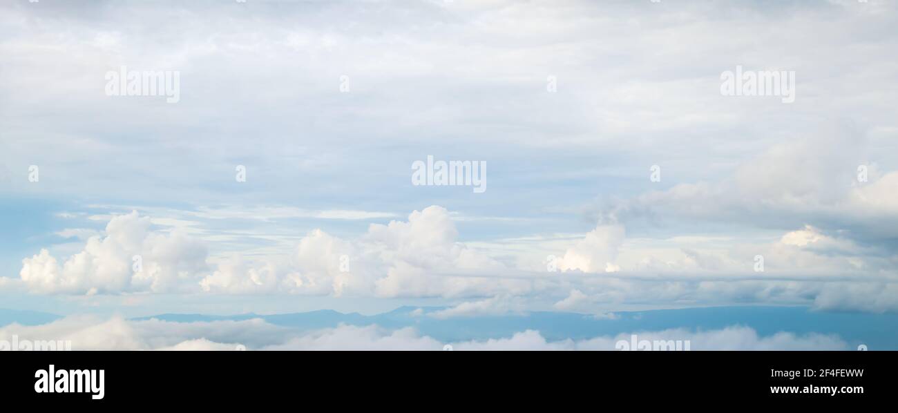 Beautiful blue sky with white fluffy clouds Stock Photo - Alamy
