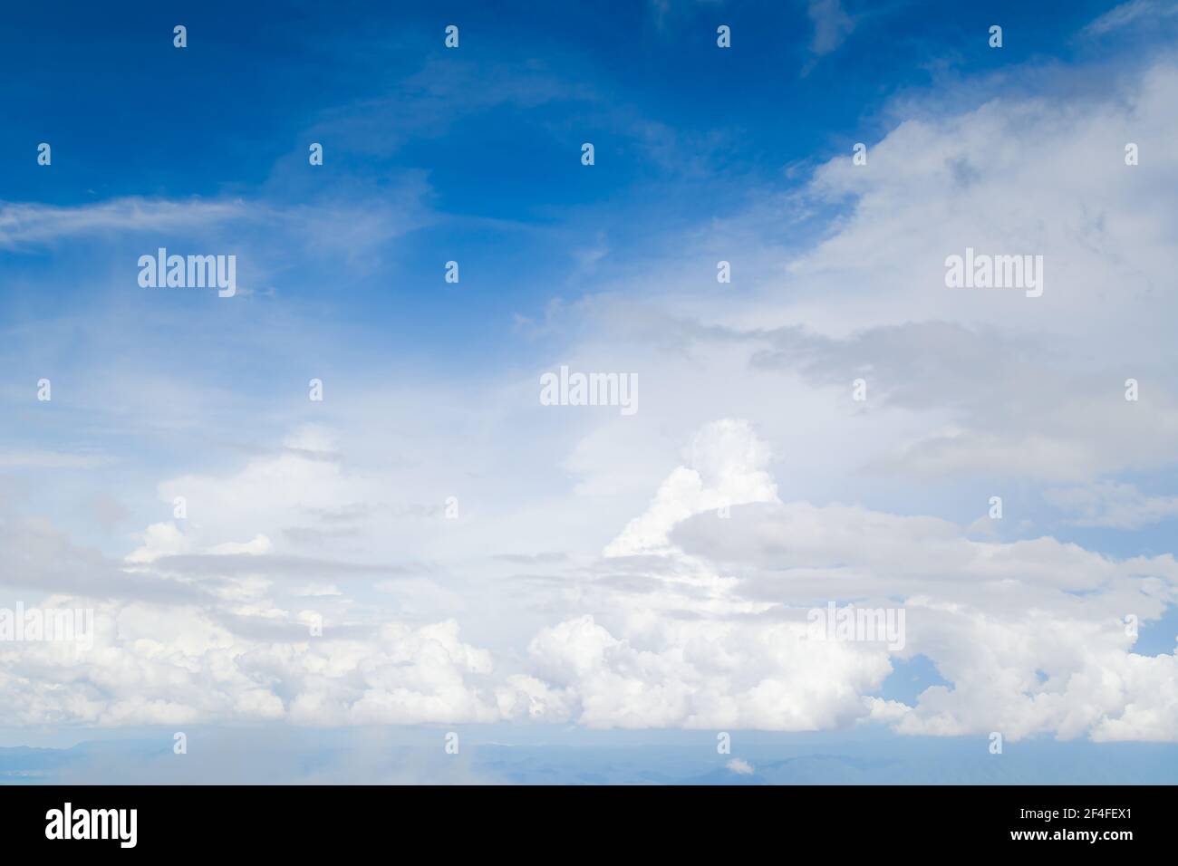 Beautiful blue sky with white fluffy clouds Stock Photo - Alamy