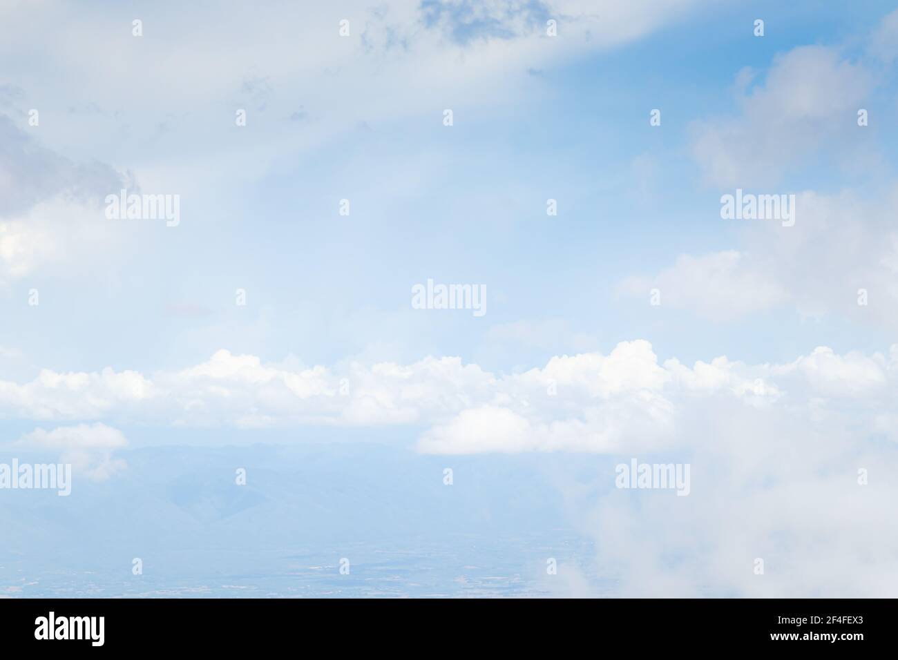 Beautiful blue sky with white fluffy clouds Stock Photo - Alamy