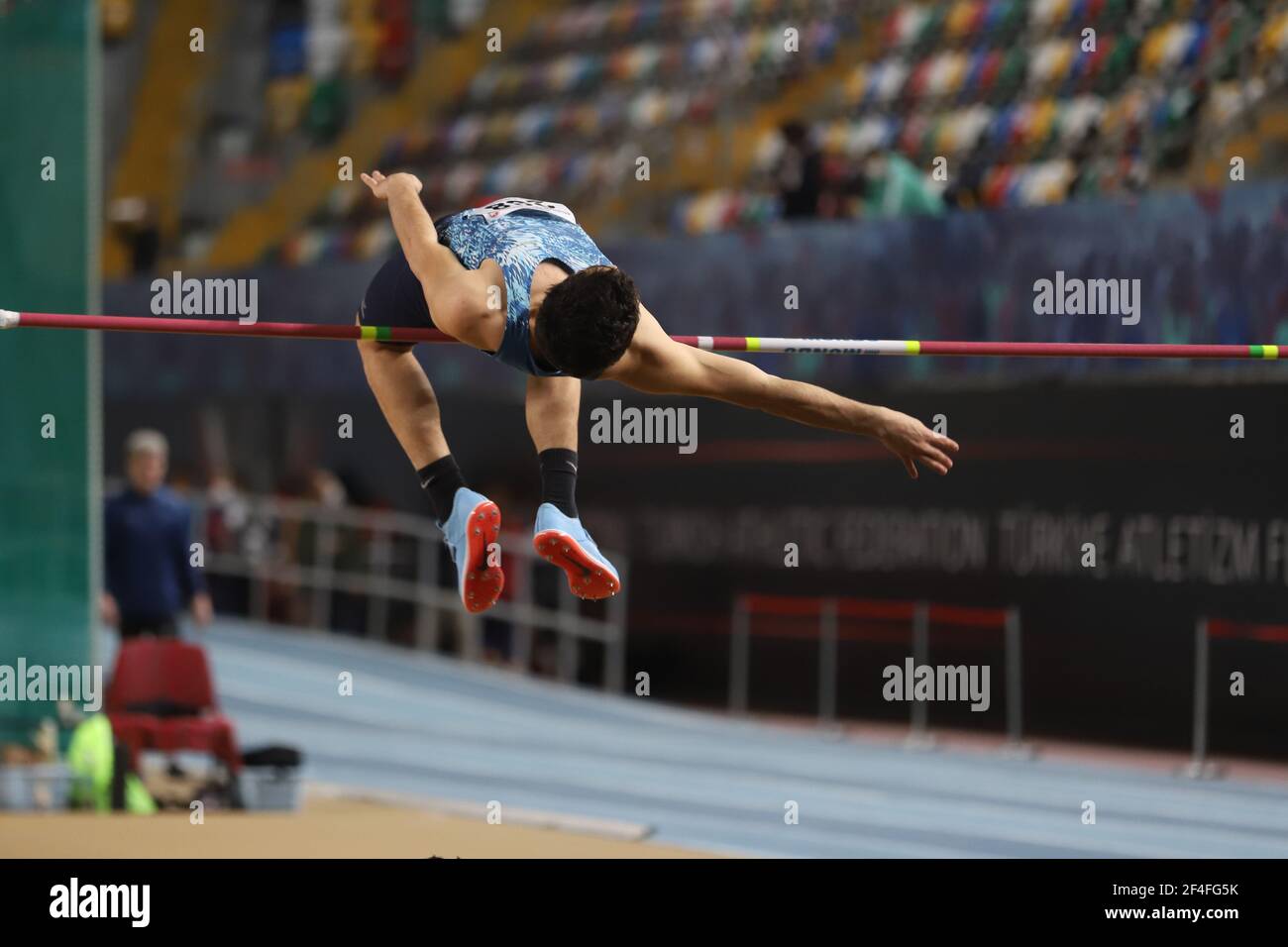ISTANBUL, TURKEY - JANUARY 30, 2021: Undefined athlete high jumping ...