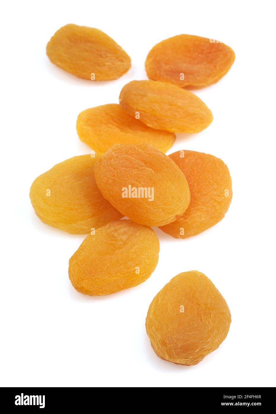 Dried apricot (Prunus armeniaca), dried fruit against white background