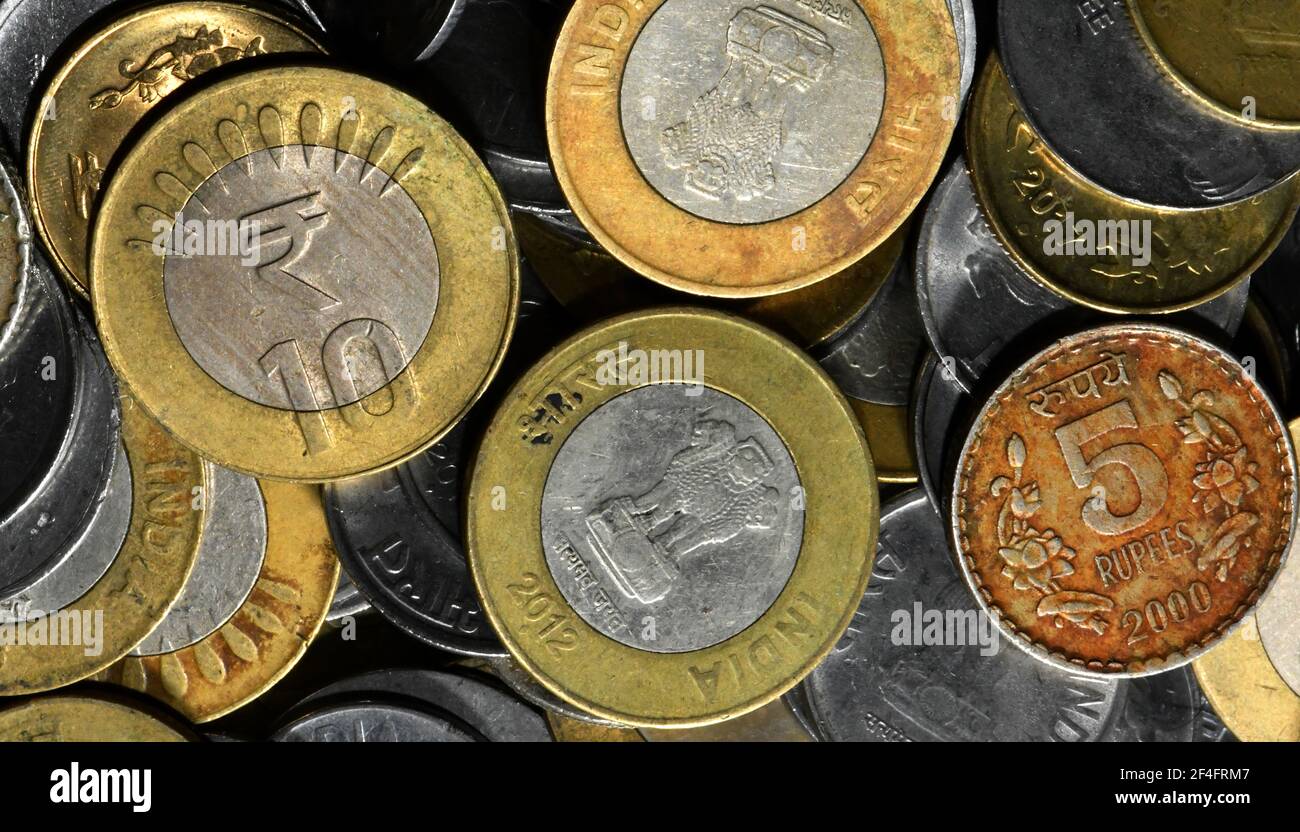 Indian coins images. Coins in India are presently being issued in denominations of one rupee, two rupees and five rupees,10 rupees. Stock Photo