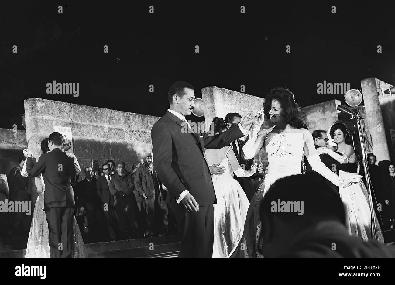 Juan Almeida presenting Miss Carnaval, Havana (Cuba : Province), Havana (Cuba), Cuba, 1964. From the Deena Stryker photographs collection. () Stock Photo