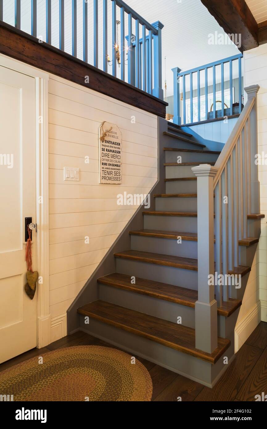Front Door A House Or Apartment With Welcome Mat And White Wooden Bannister  Stock Photo, Picture and Royalty Free Image. Image 137676465.