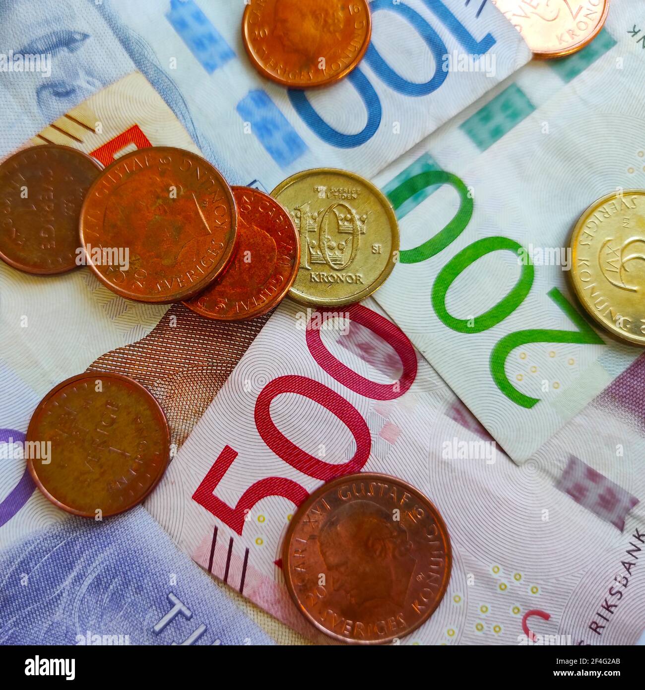 A closeup shot of Swedish banknotes and coins Stock Photo - Alamy
