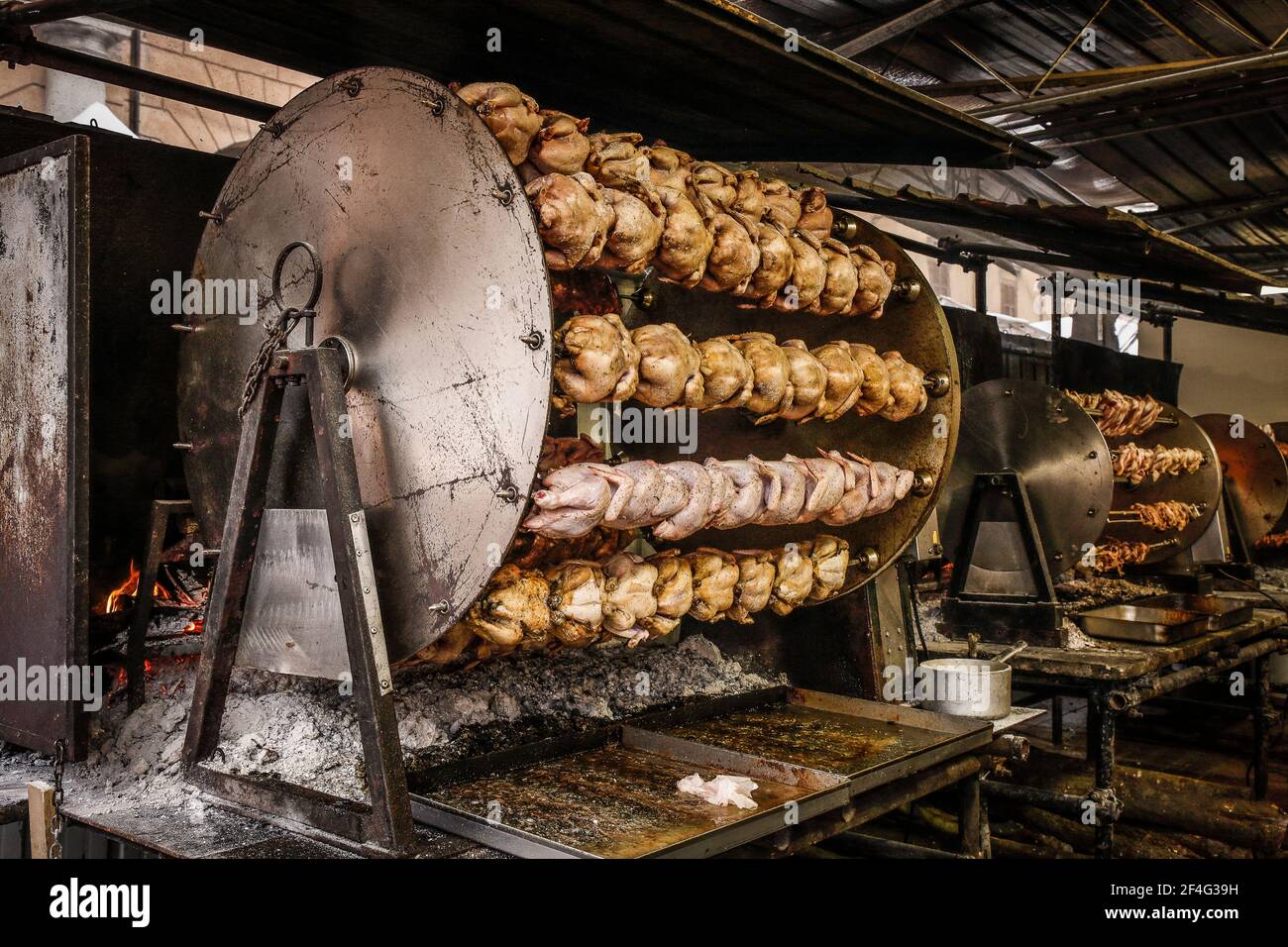 Italy Emilia Romagna - Santarcangelo di Romagna  Fiera di San Martino  - gastronomic Stand - rotisserie with chicken and meat Stock Photo