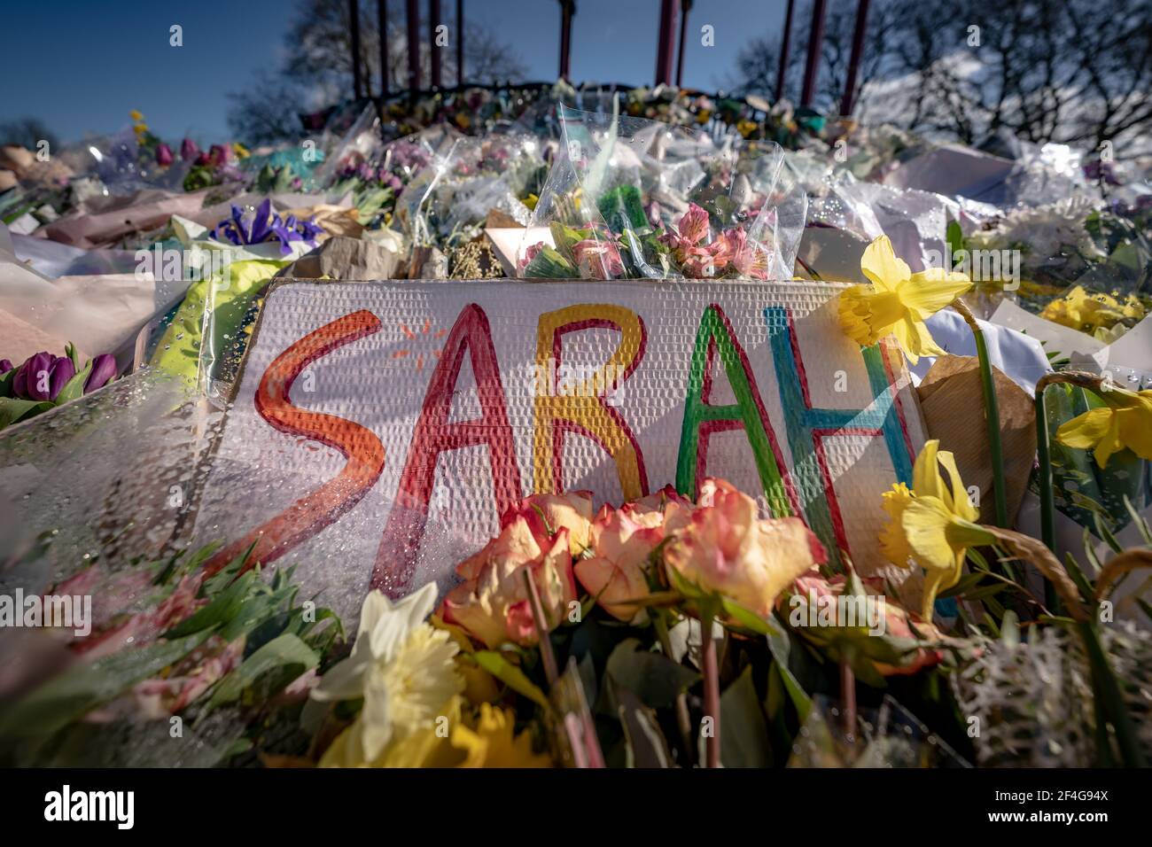 London, UK. 21st March, 2021. Death of Sarah Everard: Floral tributes continue at Clapham Common bandstand in memory of murdered 33-year-old marketing executive Sarah Everard who went missing on Wednesday 3rd March after leaving a friend's house near Clapham Common to walk home. Credit: Guy Corbishley/Alamy Live News Stock Photo