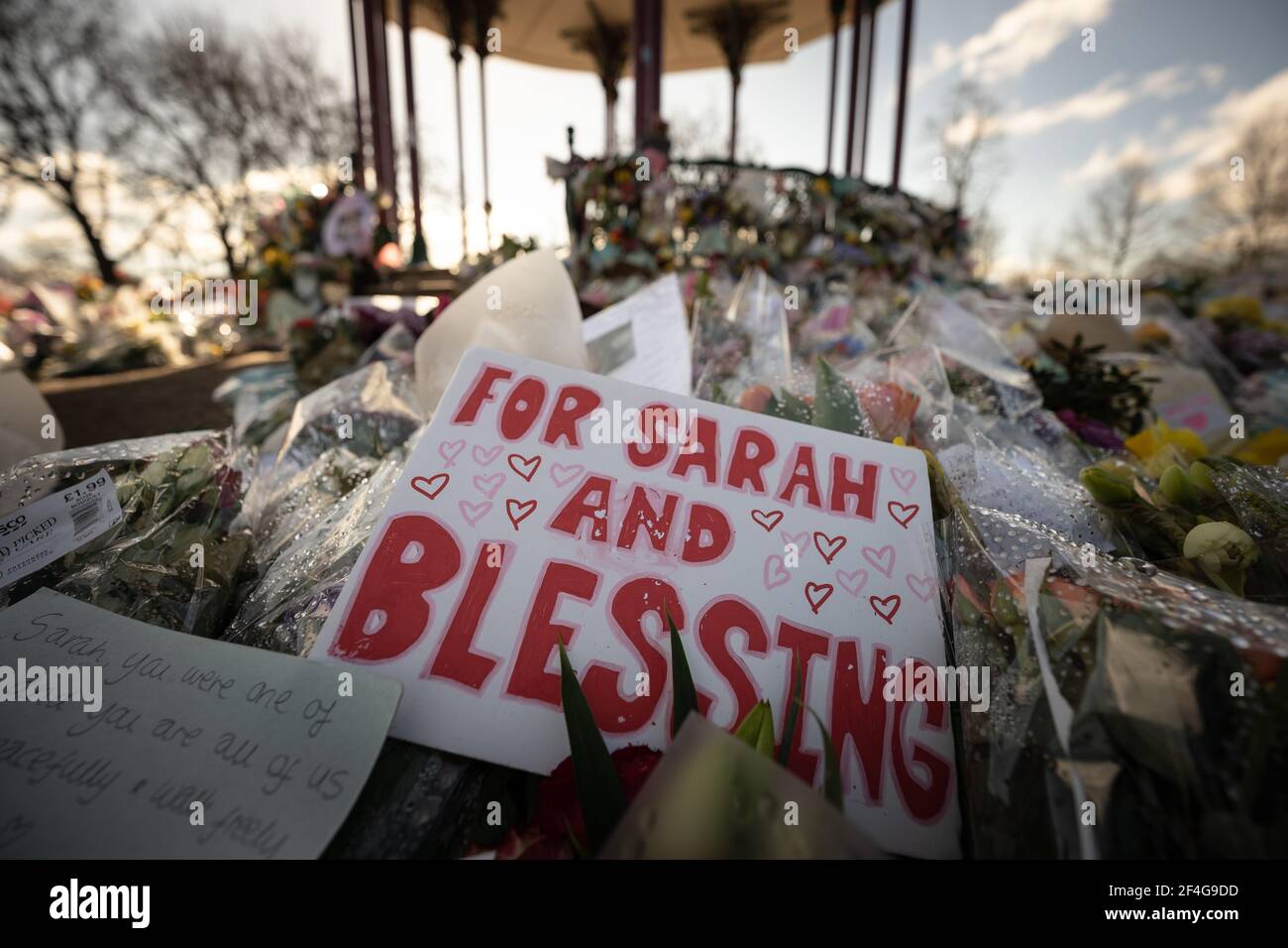 London, UK. 21st March, 2021. Death of Sarah Everard: Floral tributes continue at Clapham Common bandstand in memory of murdered 33-year-old marketing executive Sarah Everard who went missing on Wednesday 3rd March after leaving a friend's house near Clapham Common to walk home. Credit: Guy Corbishley/Alamy Live News Stock Photo