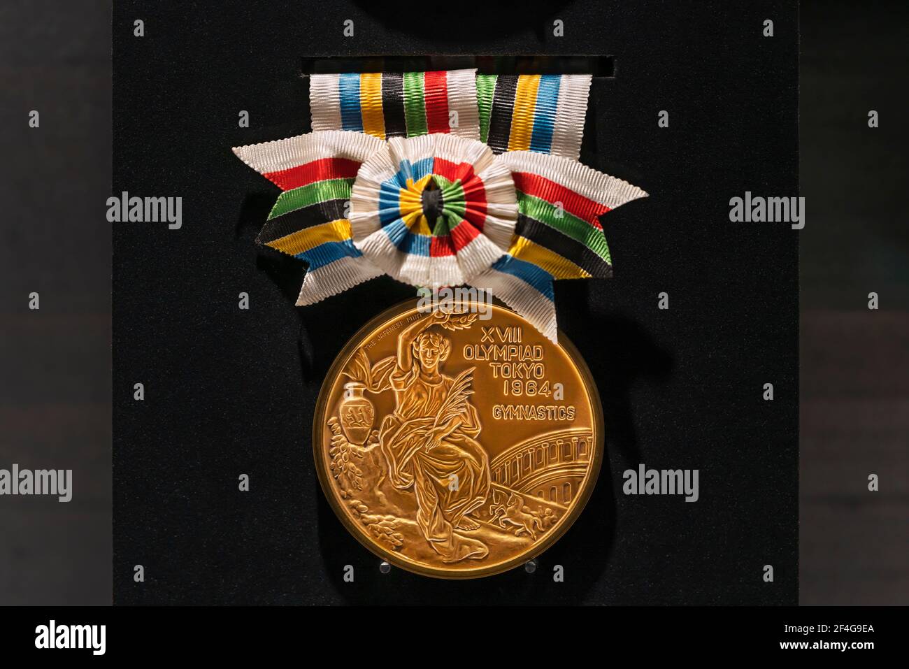 tokyo, japan - march 2 2021: Close up on the official gymnastics gold medal used during the 1964 Summer Olympics of Tokyo exhibited in the Japan Olymp Stock Photo