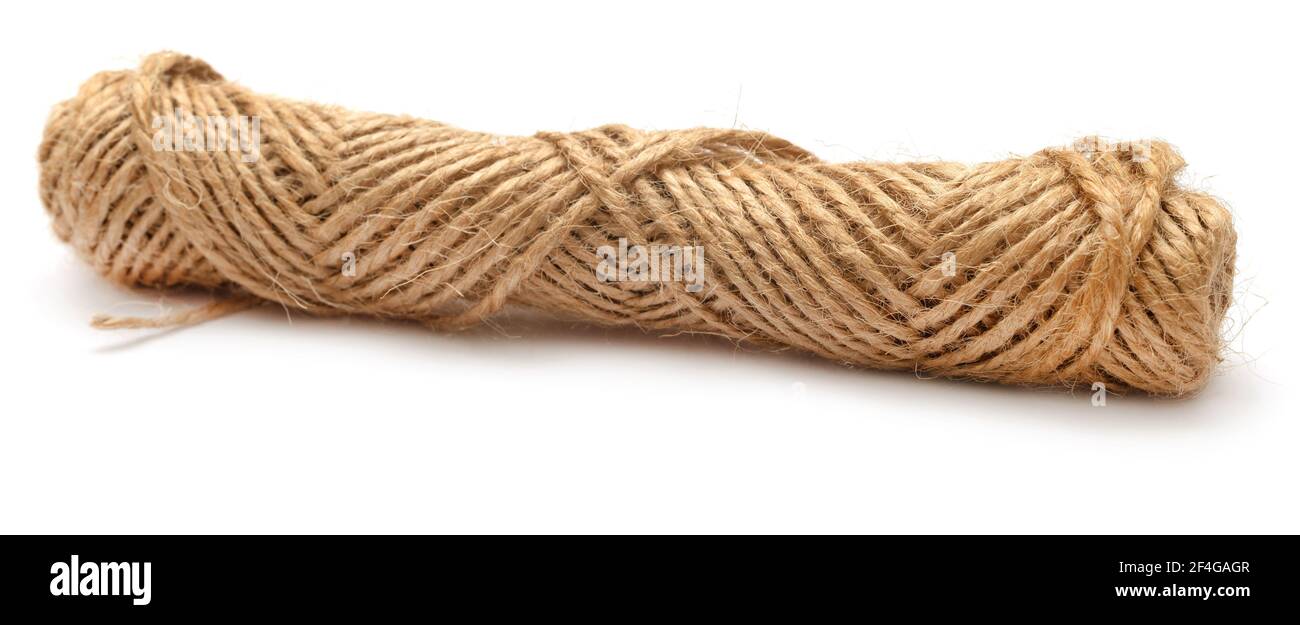 Thin rope made of jute over white background Stock Photo Alamy