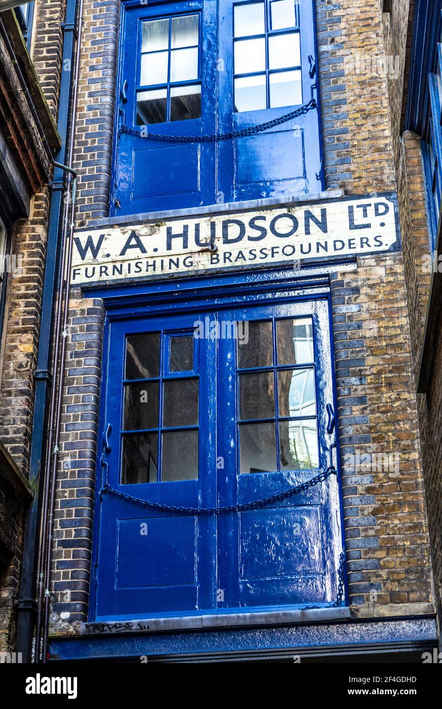 Loading doors of former W A Hudson Ltd Furnishing Brassfounders workshop, Shoreditch, London, UL Stock Photo