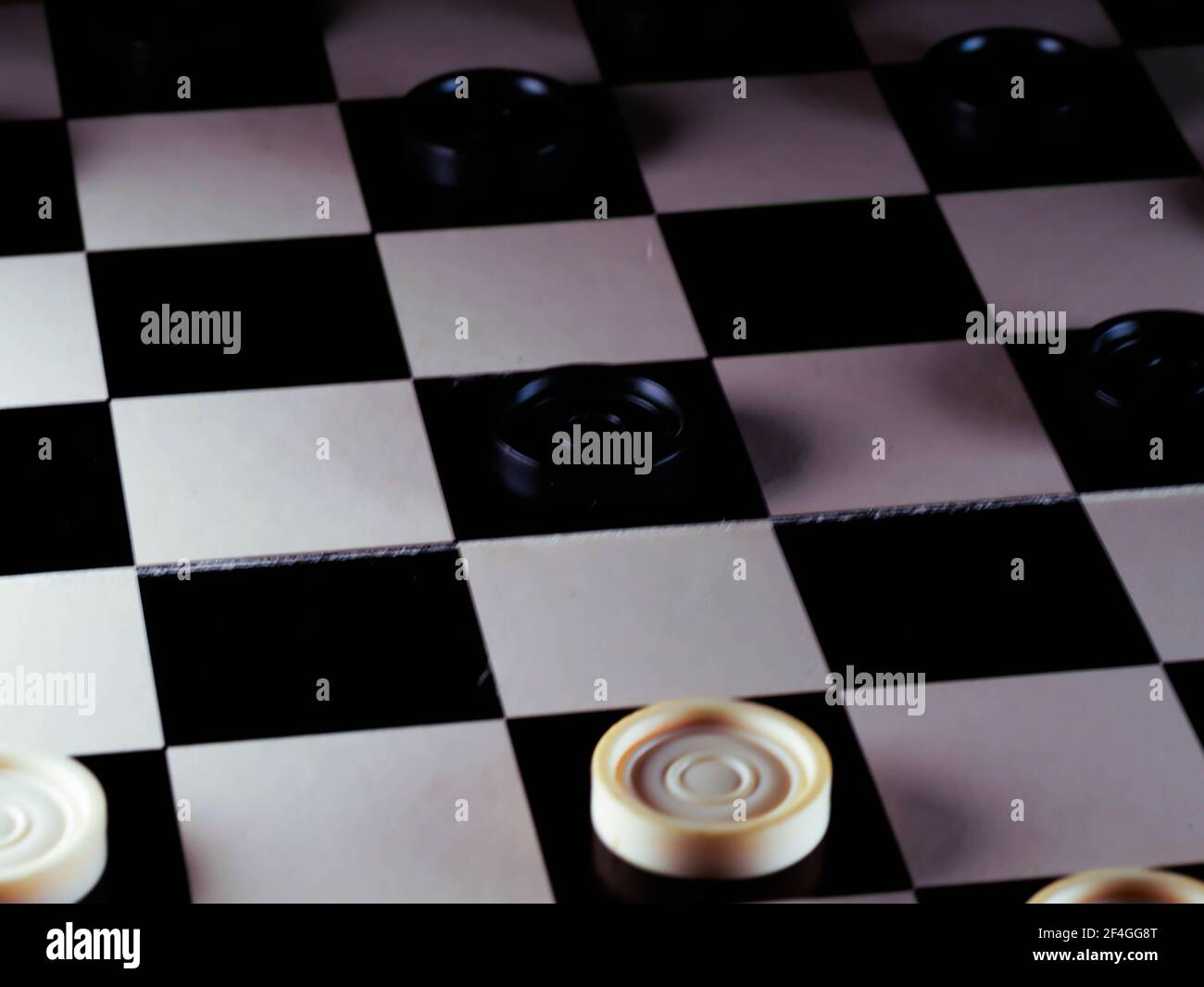 checkerboard with checkers. game concept.board game.hobby.checkers on playing field for a game Stock Photo