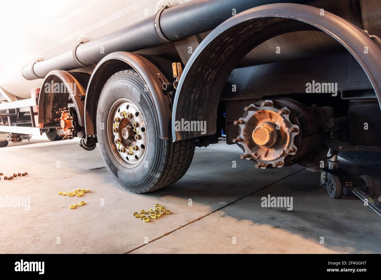 Truck in a tire shop changing wheels. Stock Photo