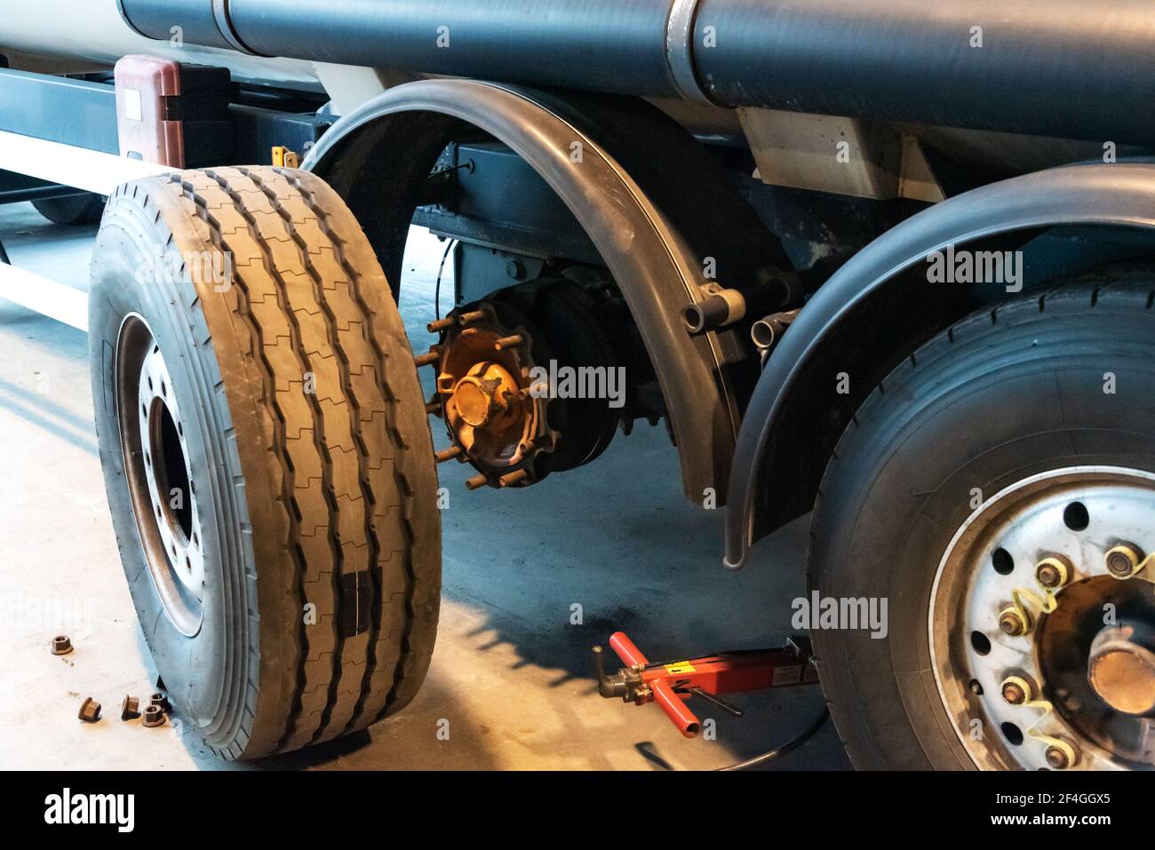 Truck in a tire shop changing wheels. Stock Photo