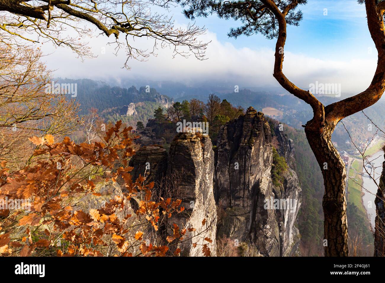 Beautiful panorama view of Elbe River and sandstone mountains in Saxon Switzerland National Park from Bastei on a sunny winter day with blue sky cloud Stock Photo