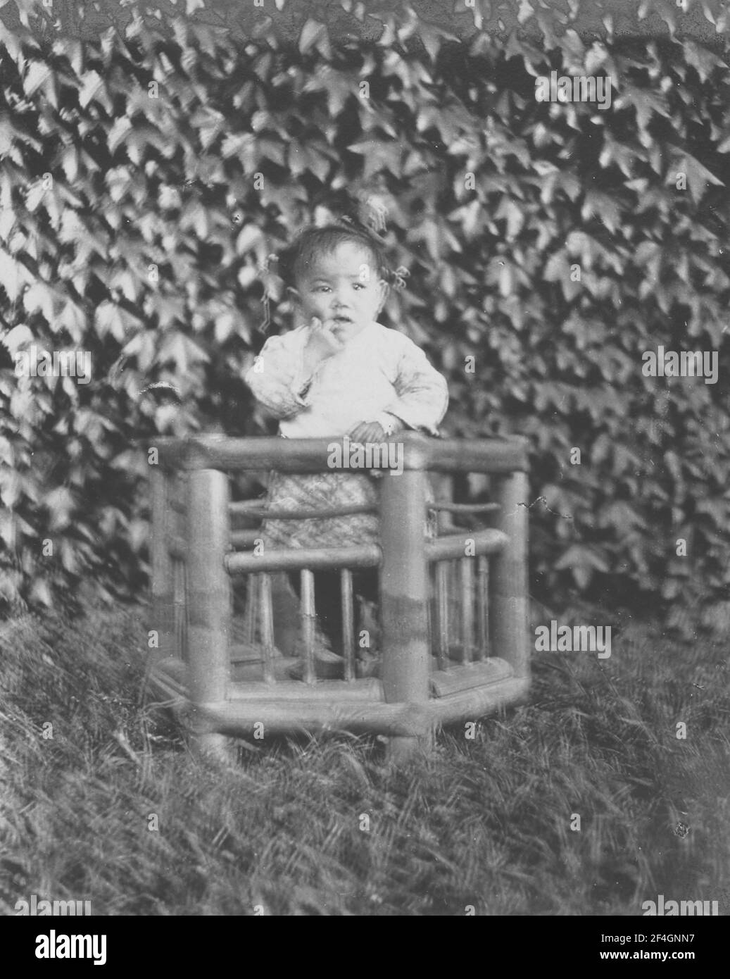 Baby in cradle, China, Shanghai (China), 1908. From the Sidney D. Gamble photographs collection. () Stock Photo