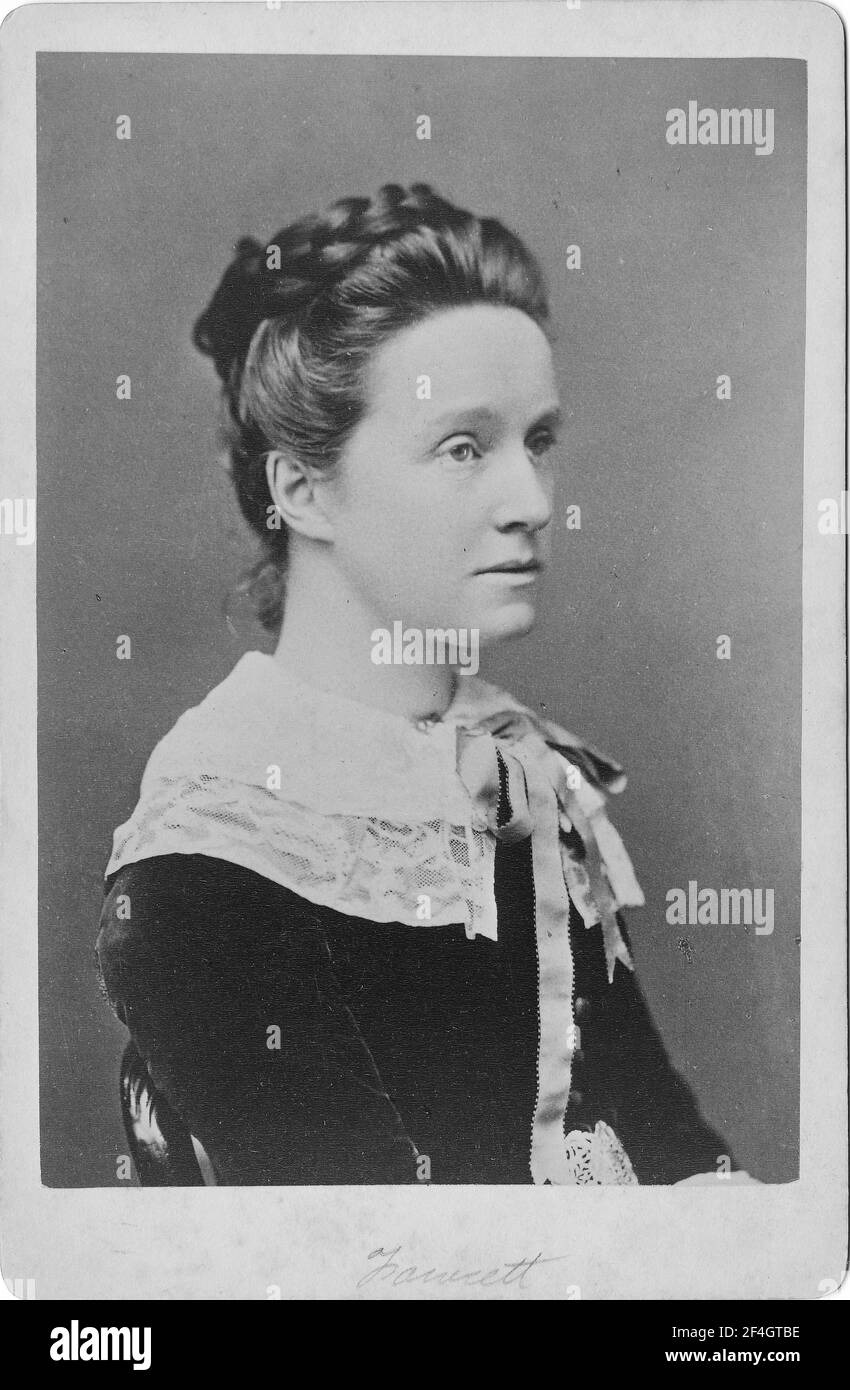 Cabinet photo with a close-up, three-quarter profile portrait of English suffragist and writer Millicent Fawcett, seated in a chair, photographed by W and D Downey, London, England, 1890. Photography by Emilia van Beugen. () Stock Photo
