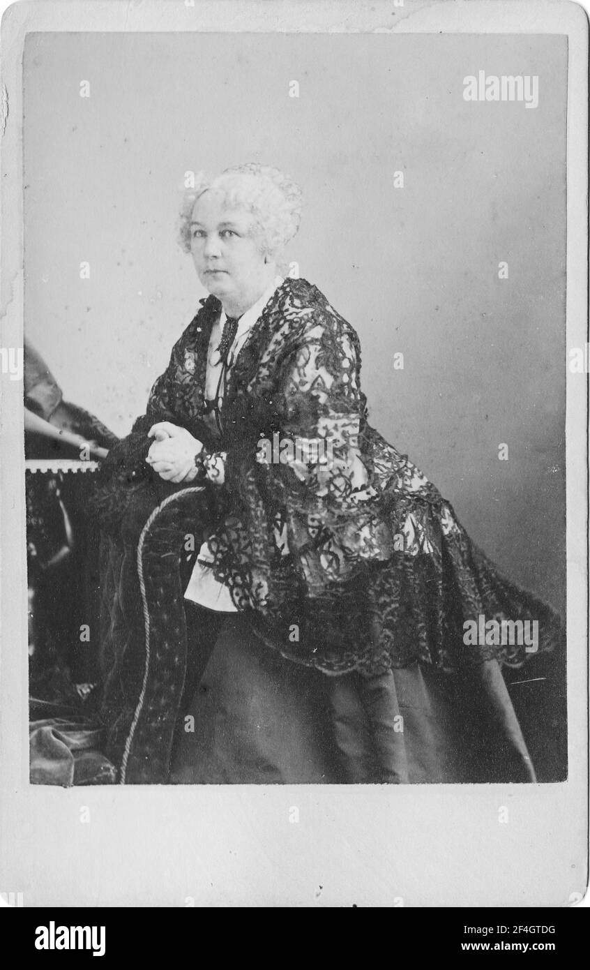 Cabinet photo with a three-quarter length portrait, in partial profile, of suffragist and abolitionist Elizabeth Cady Stanton, with a serious expression on her face, photographed by Sarony and Company, New York, 1885. Photography by Emilia van Beugen. () Stock Photo