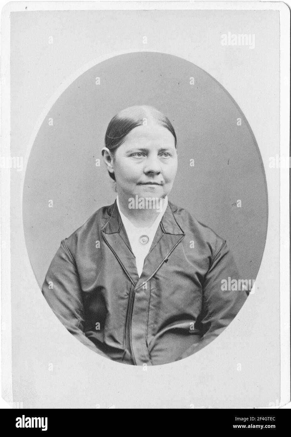 Cabinet photo with a portrait, from the waist up, of suffragist and abolitionist Lucy Stone, with a relaxed expression on her face, photographed by Sumner B Heald, Boston, Massachusetts, 1875. Photography by Emilia van Beugen. () Stock Photo