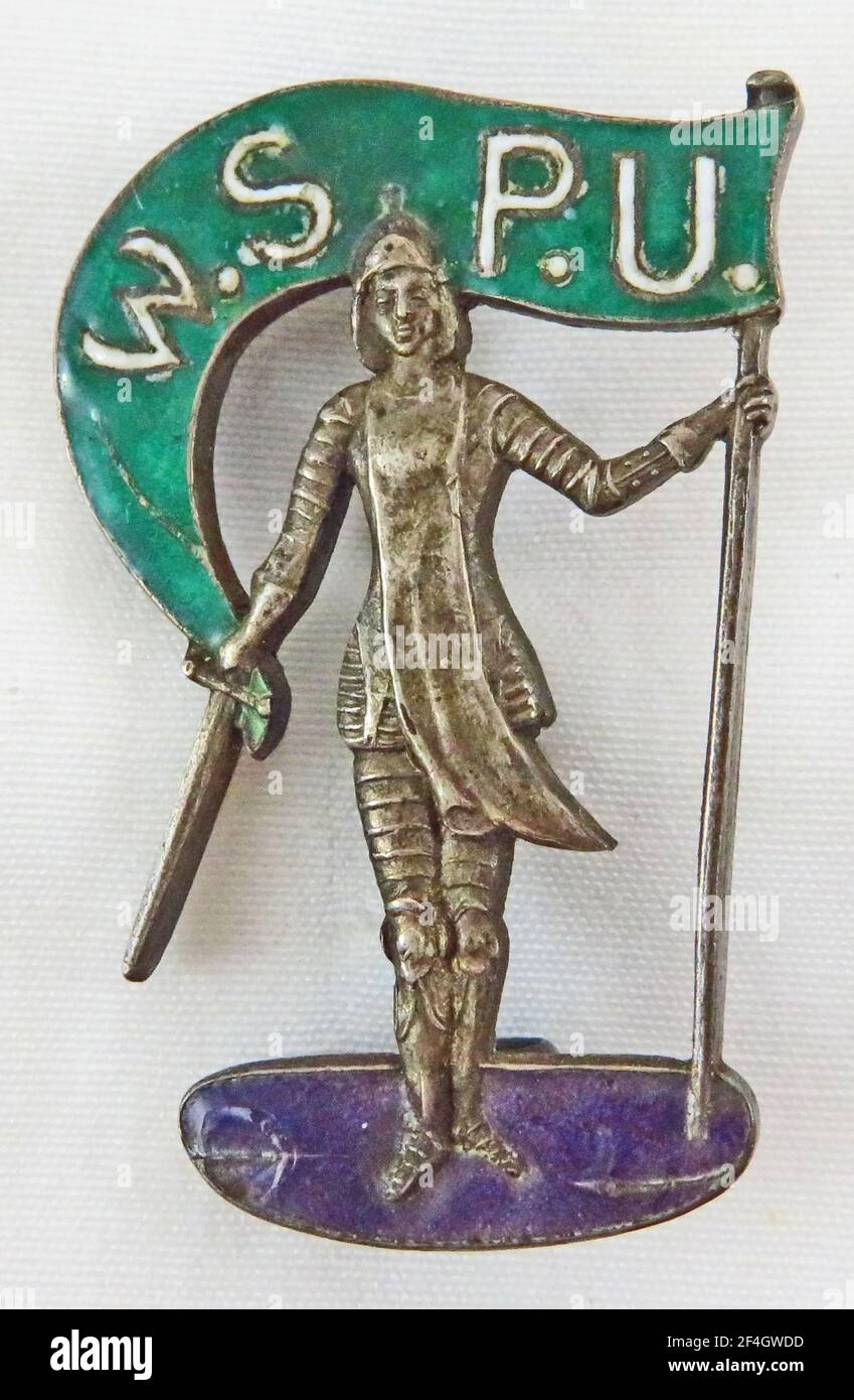 Pin depicting Joan of Arc, a symbol of the women's suffrage movement, issued by the militant women's suffrage group Women's Social and Political Union, United Kingdom, 1910. Photography by Emilia van Beugen. () Stock Photo