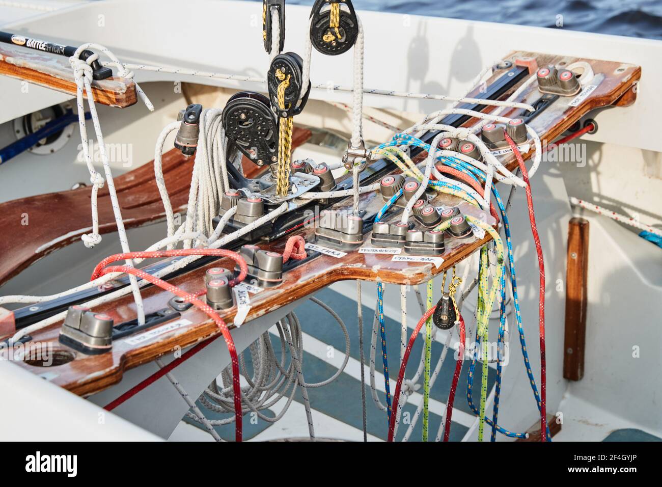 Set of ropes for management of the sailboat of different color, the signature to each rope