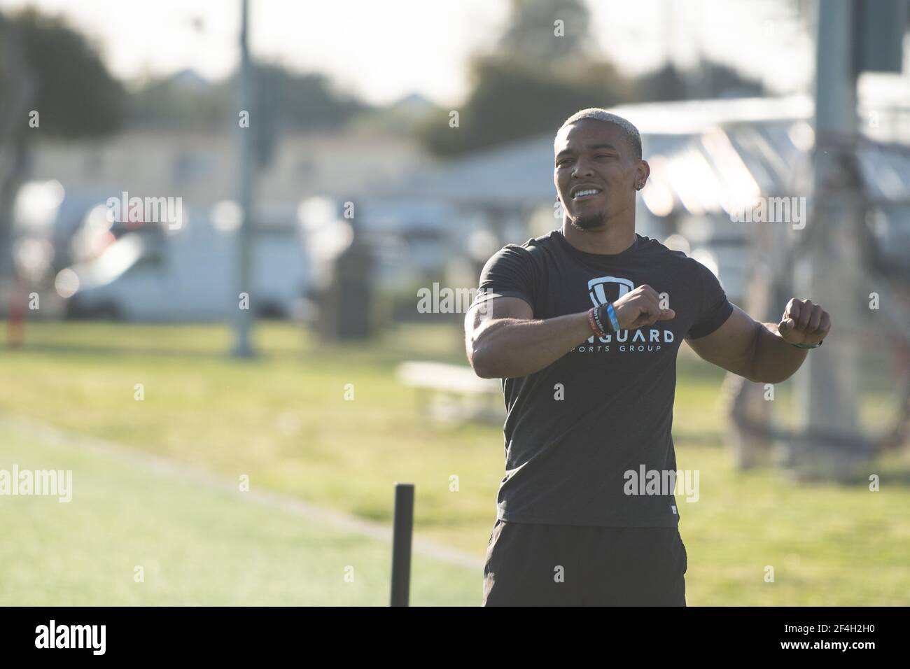 Los Angeles, USA. 19th Mar, 2021. American football player Amon-Ra St. Brown is warming up. The 21-year-old is looking to make it to the NFL and has a tryout day on Wednesday, March 24, 2021. Credit: Maximilian Haupt/dpa/Alamy Live News Stock Photo