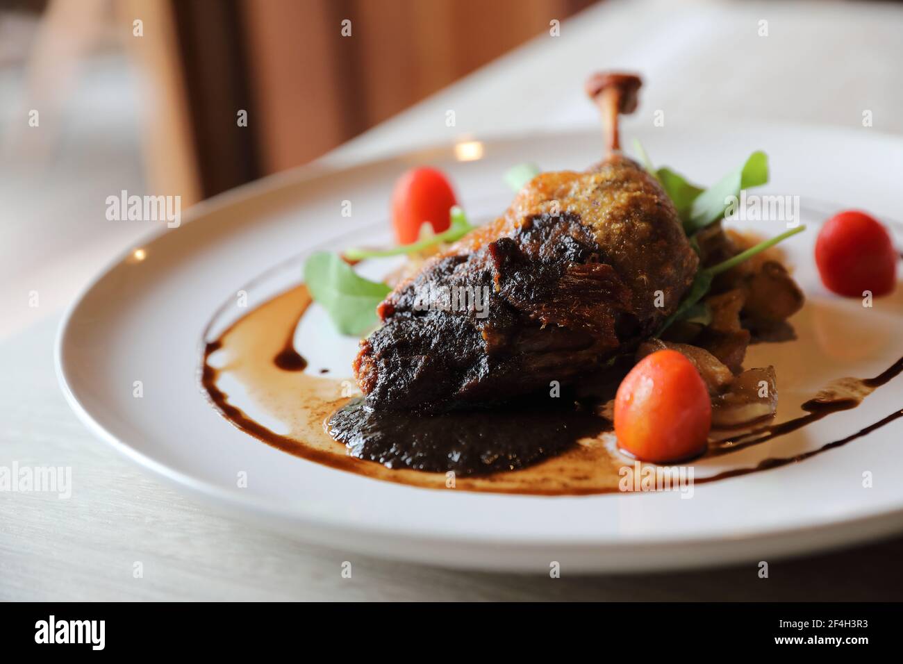 duck confit , Roasted Duck leg French food Stock Photo - Alamy
