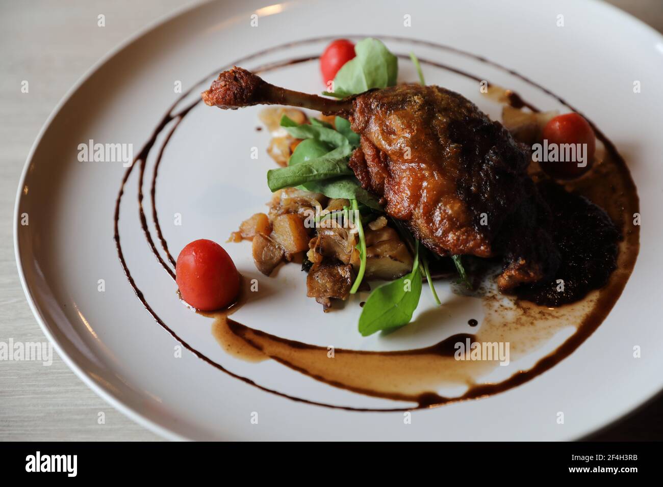 duck confit , Roasted Duck leg French food Stock Photo - Alamy