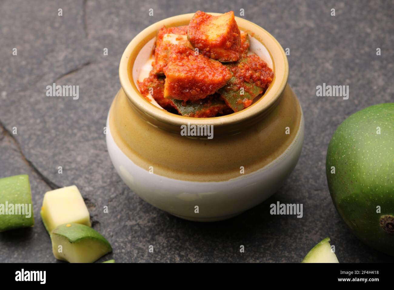 Homemade Mango Pickle or aam ka achar Kairi Loncha with Ingredients. Stock Photo