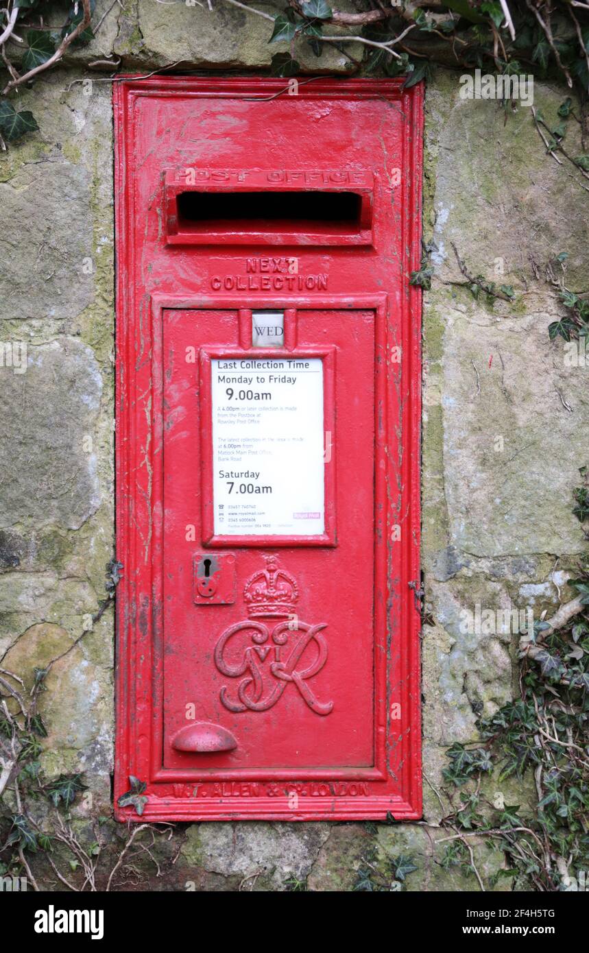 King George VI wall mounted collection box at Pilough near Rowsley in Derbyshire Stock Photo