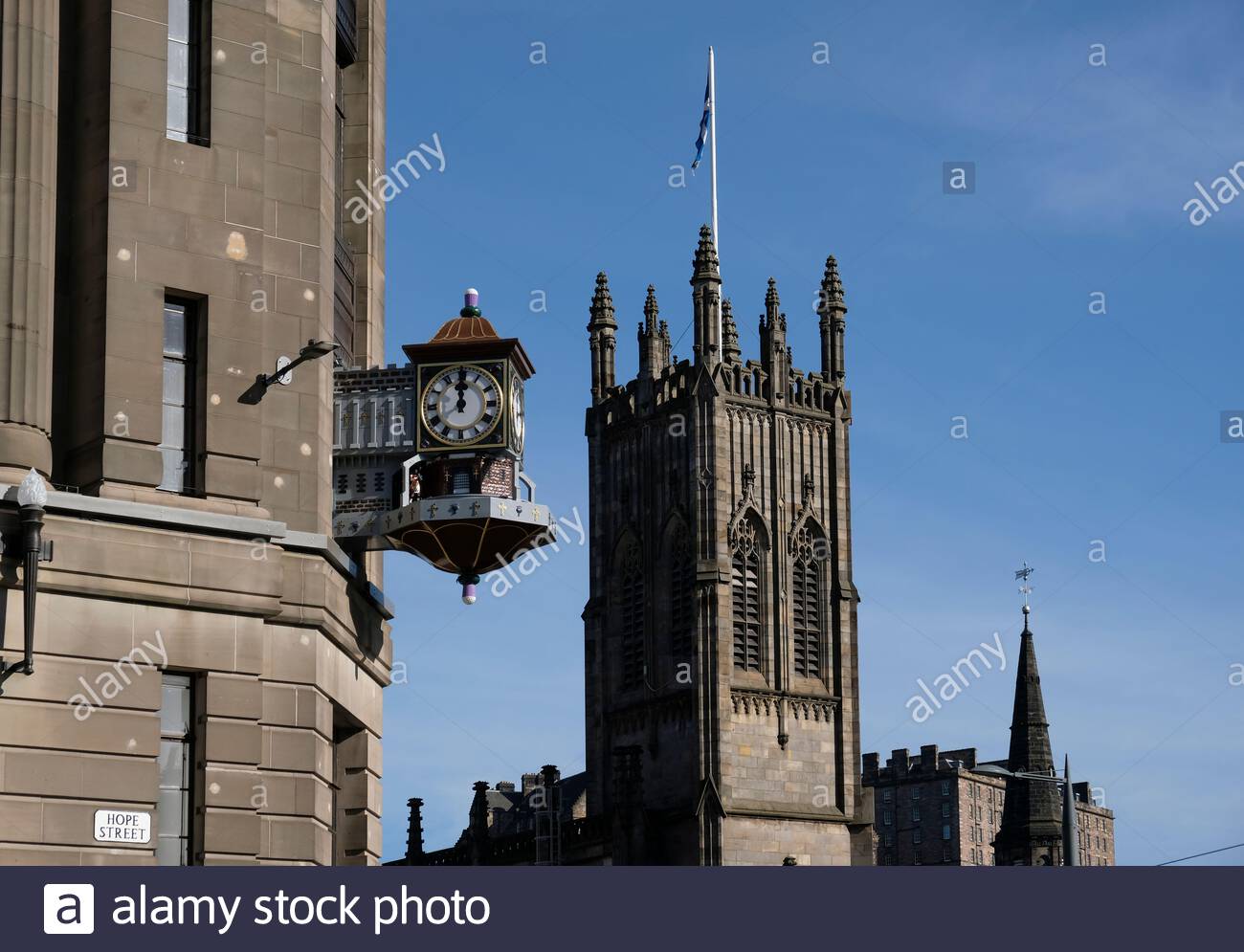 A Restored Binns Clock and a view of St. Johns Church at the West End of Princes Street and Shandwick Place, Edinburgh Scotland Stock Photo