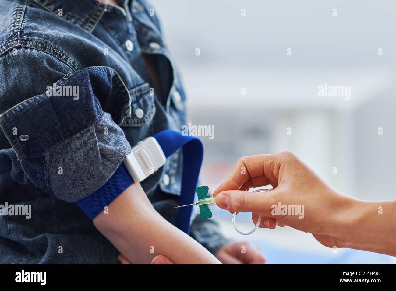 Little boy having blood sample drawn in a lab Stock Photo Alamy