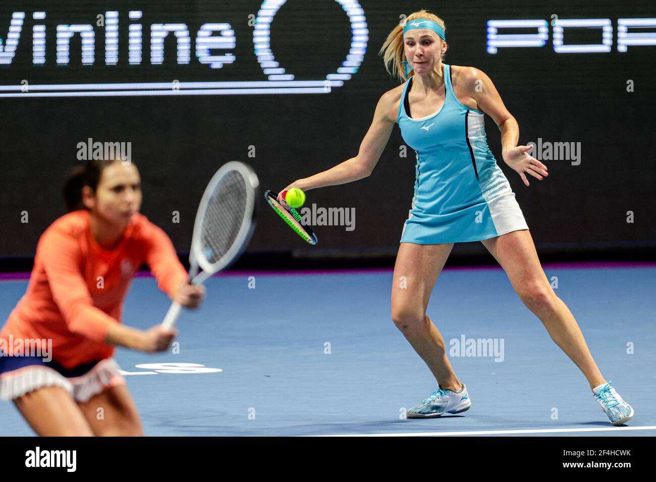 ST PETERSBURG, RUSSIA - MARCH 21: Nadiia Kichenok of Ukraine and Raluca Olaru of Romania playing doubles during their match against Kaitlyn Christian of the United States and Sabrina Santamaria of the United States during the finals of the 2021 St Petersburg Ladies Trophy, WTA 500 tennis tournament at Sibur Arena on March 21, 2021 in St Petersburg, Russia (Photo by Anatolij Medved/Orange Pictures)*** Local Caption *** Nadiia Kichenok Credit: Orange Pics BV/Alamy Live News Stock Photo