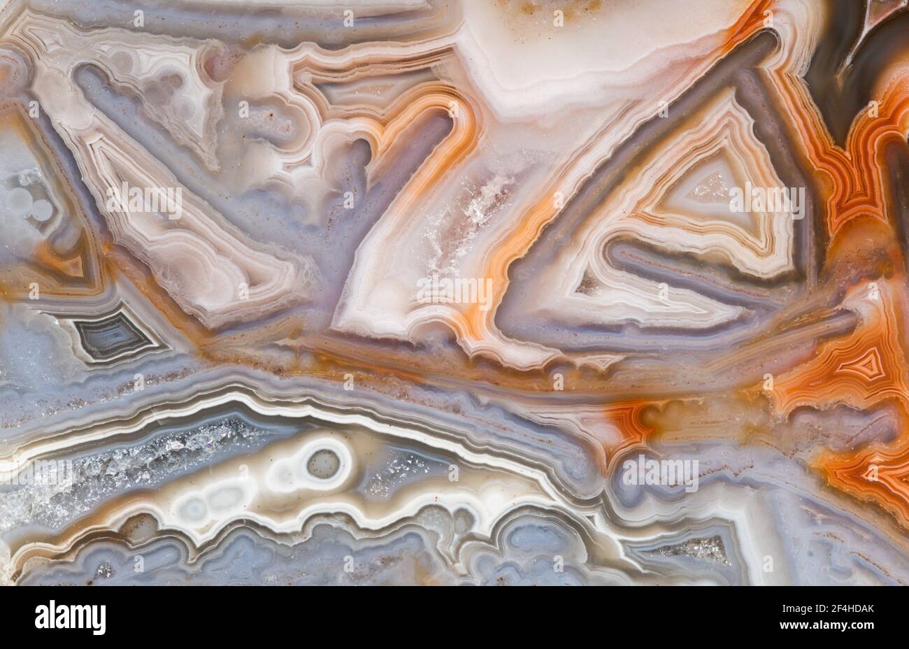 Macro photograph of the chaotic structure in a Crazy Lace agate from Mexico Stock Photo