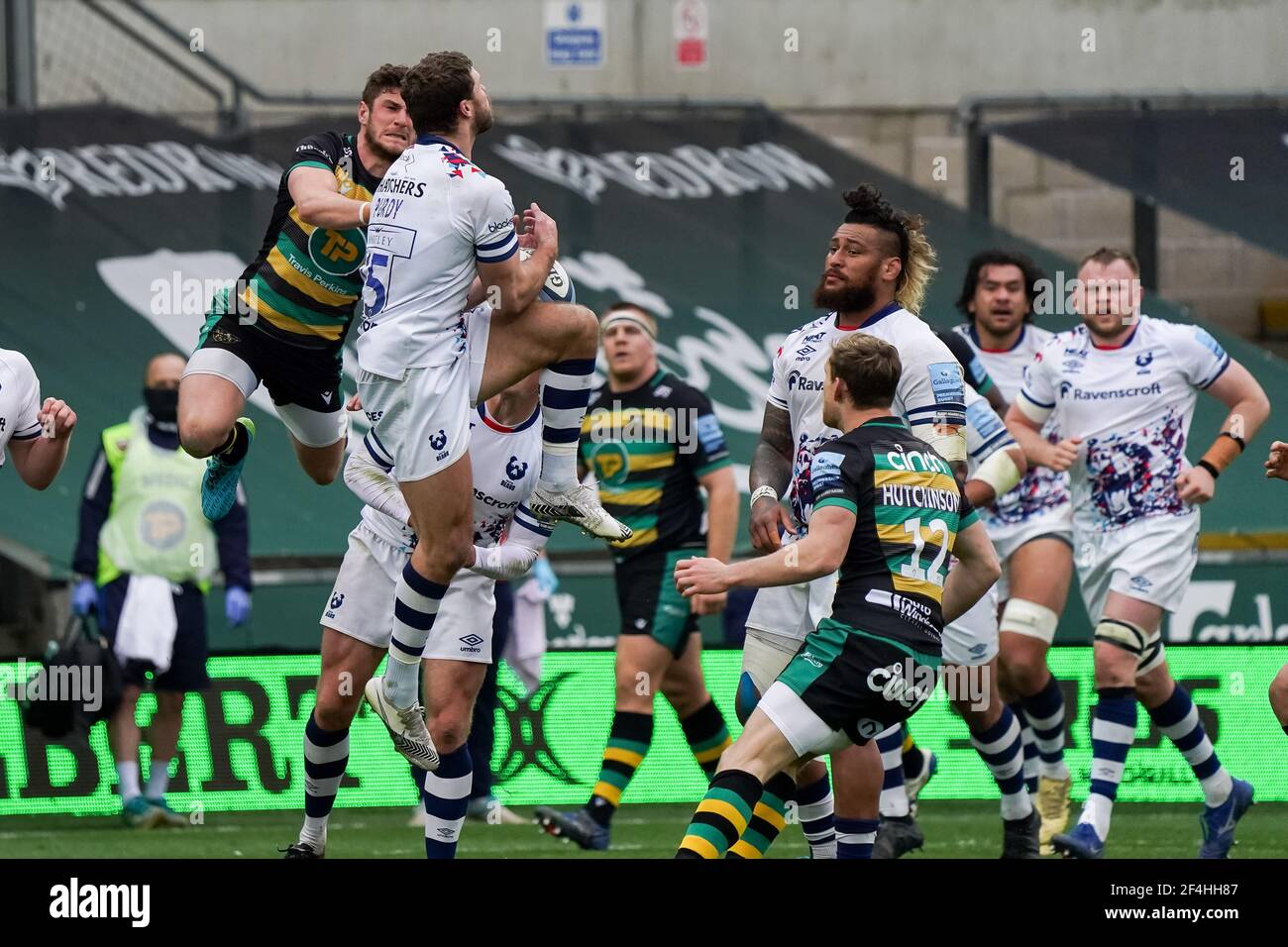 Northampton, UK. 21st Mar, 2021. James Grayson #10 of Northampton Saints and Henry Purdy #15 of Bristol Rugby battle in mid air in Northampton, UK on 3/21/2021. (Photo by Richard Washbrooke/News Images/Sipa USA) Credit: Sipa USA/Alamy Live News Stock Photo