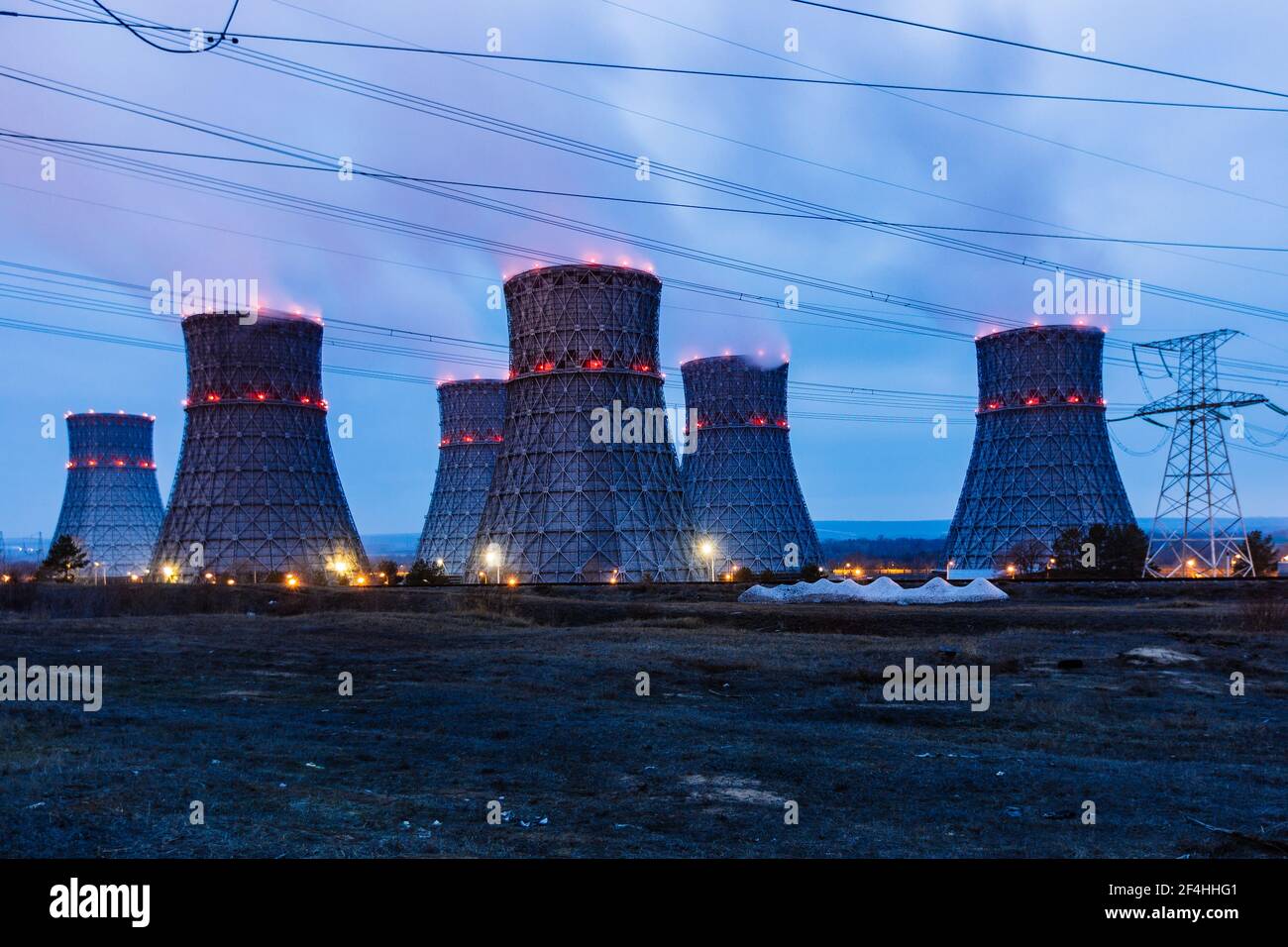 Cooling tower of nuclear power plant at night Stock Photo - Alamy