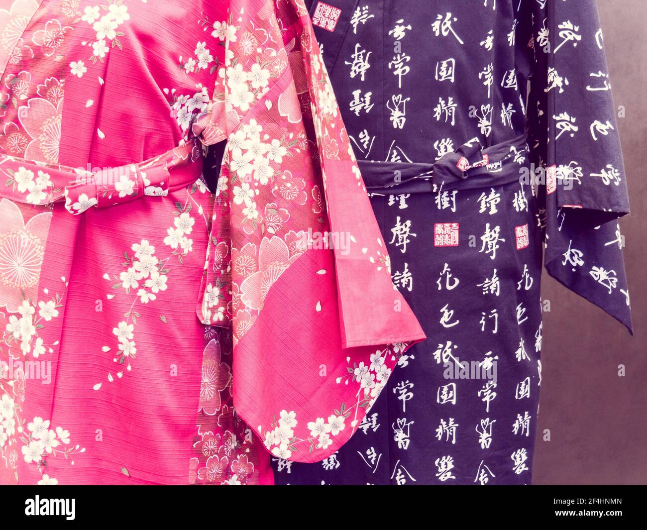 A closeup of the two beautiful and colorful traditional Japanese Kimono