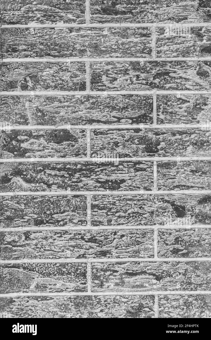 Dark grey abstract brick wall vertical texture background Stock Photo ...