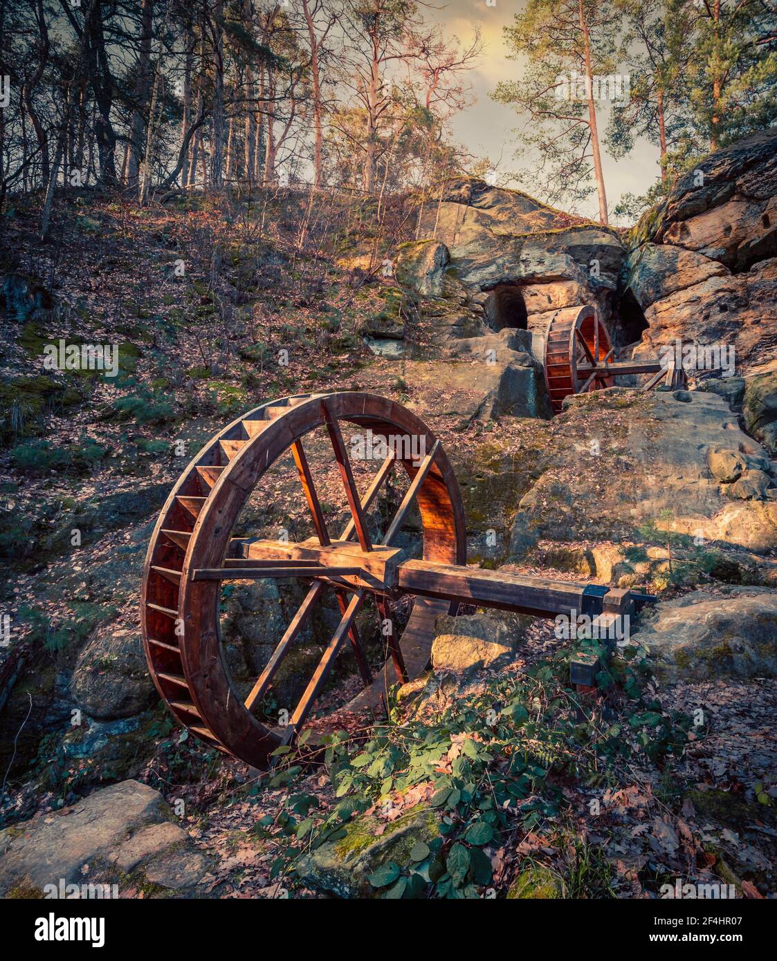 A majestic rural view of wooden watermill wheel in the countryside of Blankenburg, Germany Stock Photo