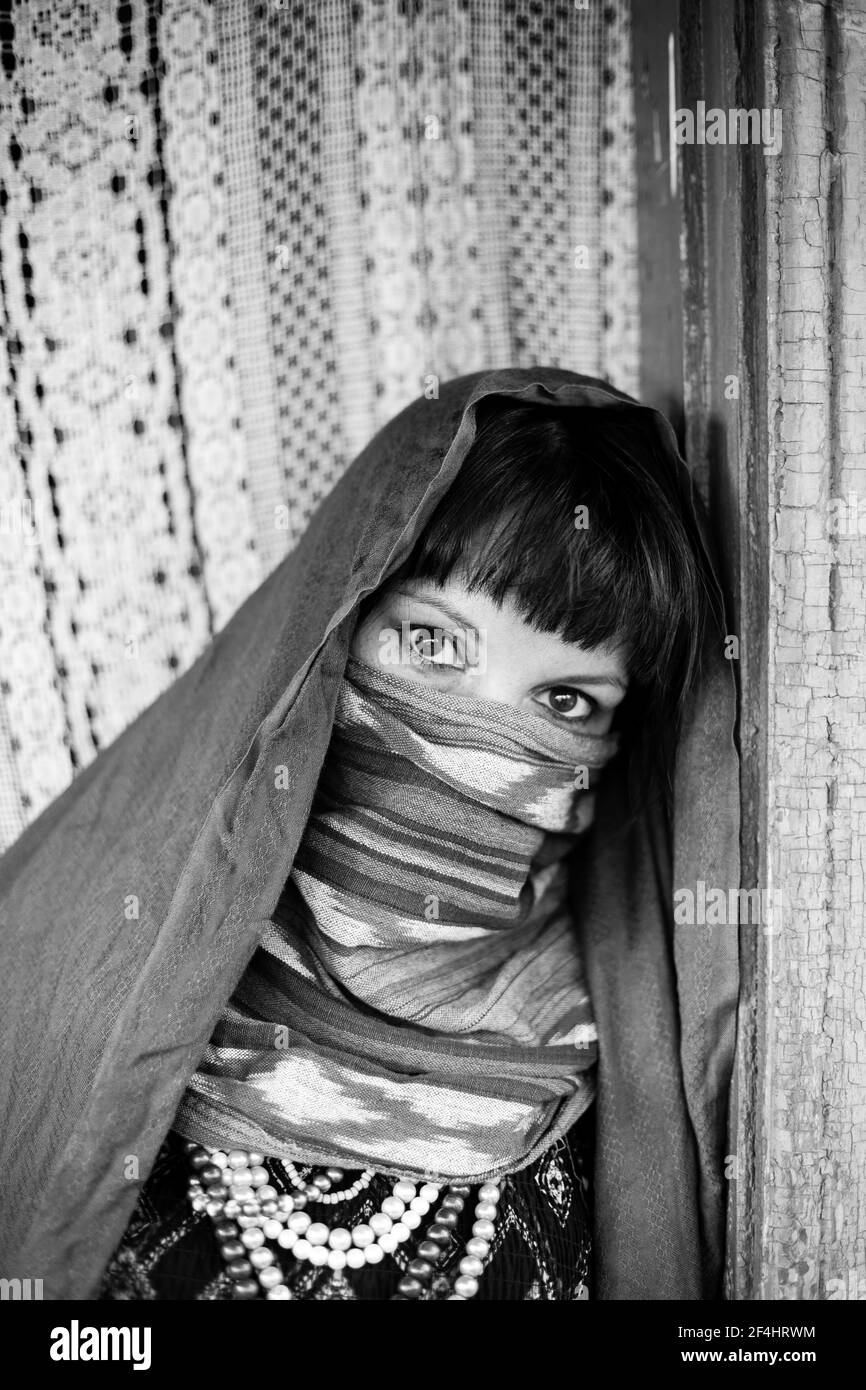 An woman covering her face with a veil. Black and white photo Stock ...