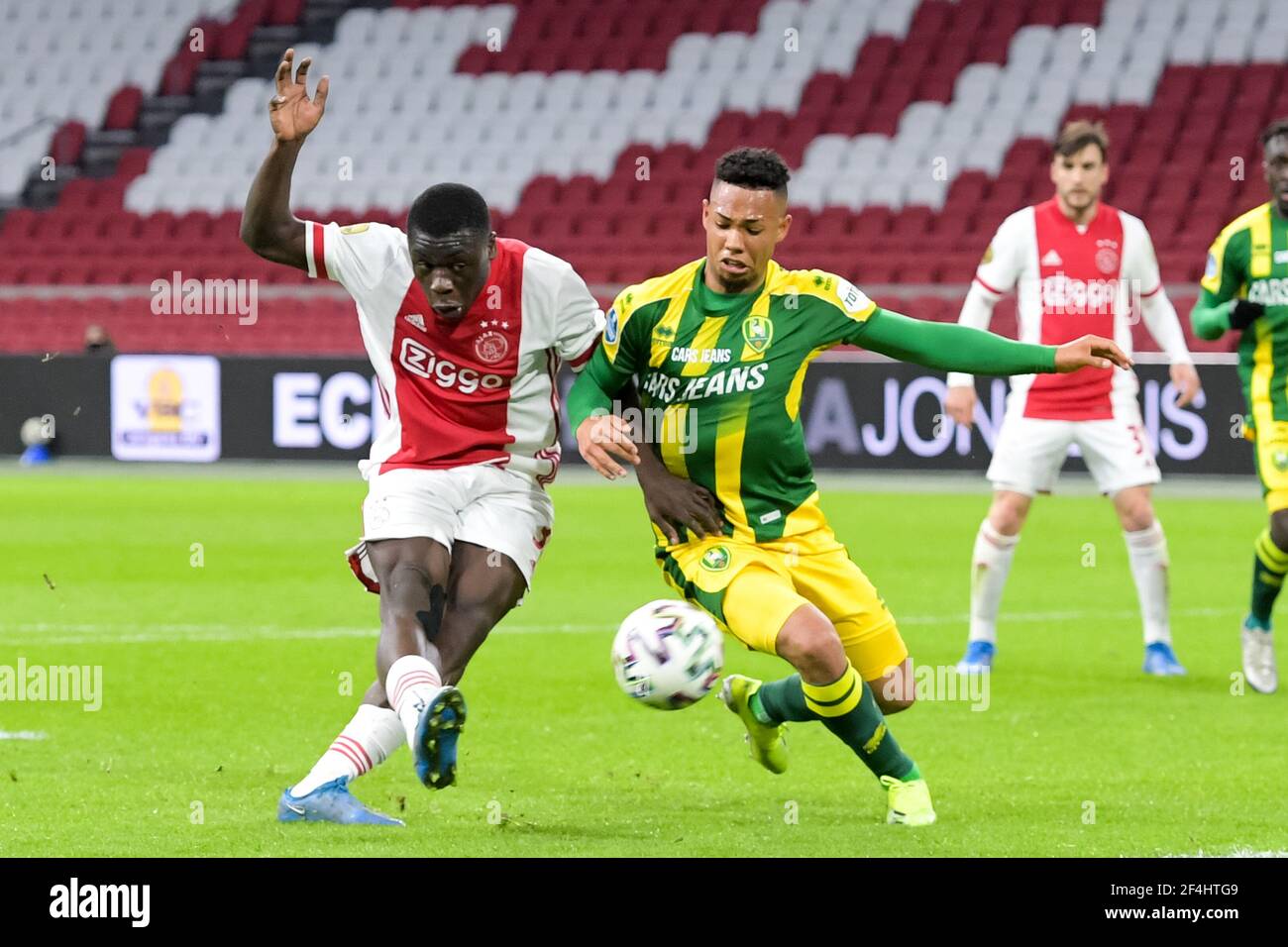 AMSTERDAM, NETHERLANDS - MARCH 21: Brian Brobbey of Ajax scores his sides second goal during the Eredivisie match between Ajax and ADO Den Haag at Joh Stock Photo