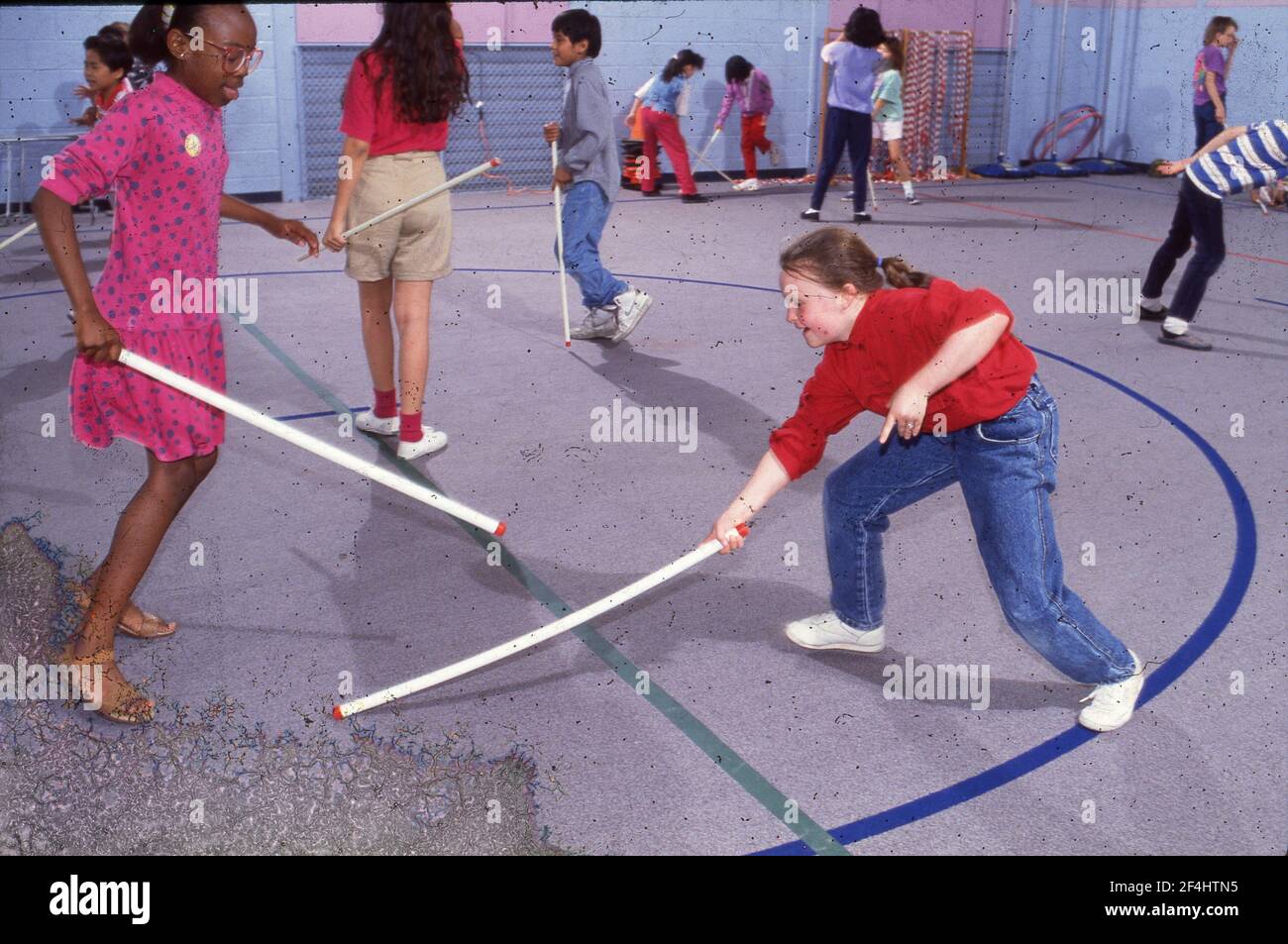 Cooperative Education: 'Toe Fencing' in physical education class, Walnut Creek Elementary School, 1992 Stock Photo