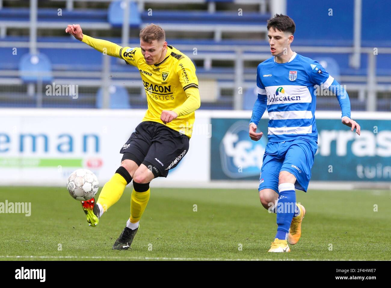 ZWOLLE, NETHERLANDS - MARCH 21: Tobias Pachonik of VVV Venlo and Destan Bajselmani of PEC Zwolle during the Dutch Eredivisie match between PEC Zwolle Stock Photo