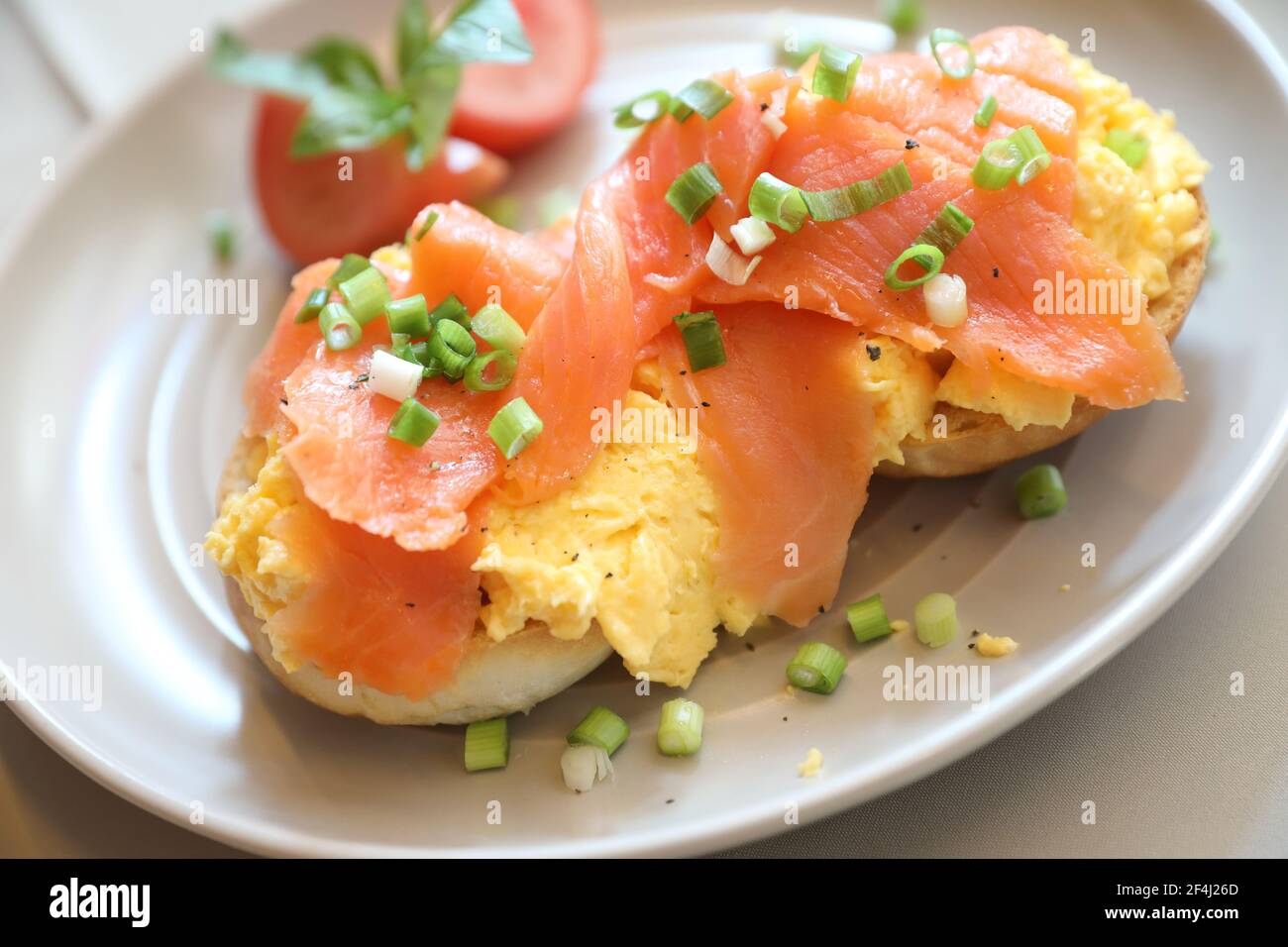 Scrambled eggs with smoked salmon on toast , Breakfast food Stock Photo