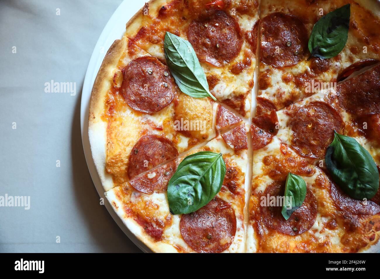 Hot Pepperoni Pizza in dish , Italian food Stock Photo Alamy
