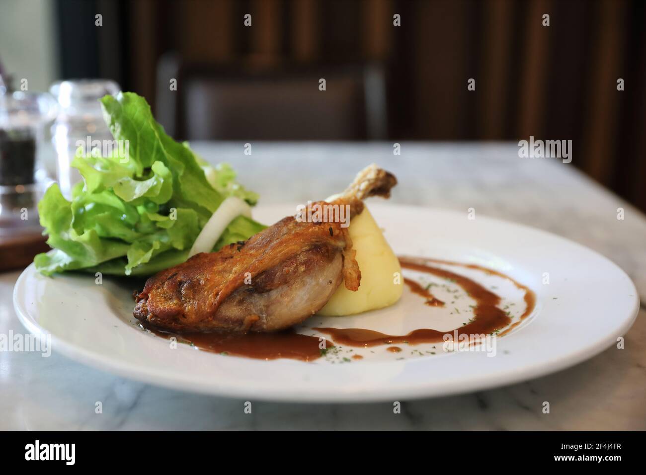 confit de canard , Duck confit with vegetable Stock Photo - Alamy