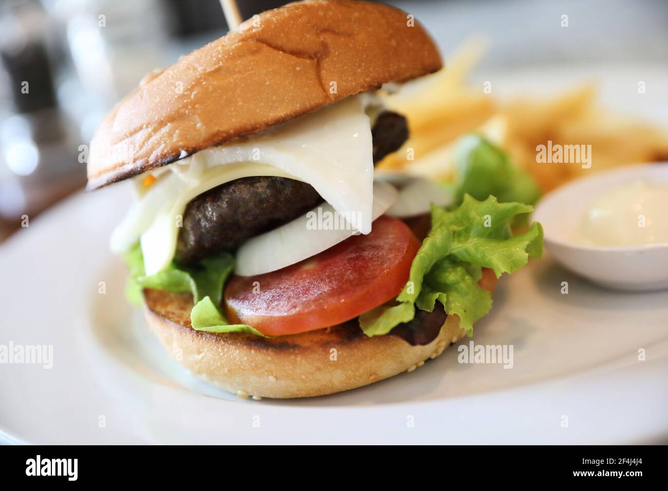 Beef hamburger with fries Stock Photo Alamy